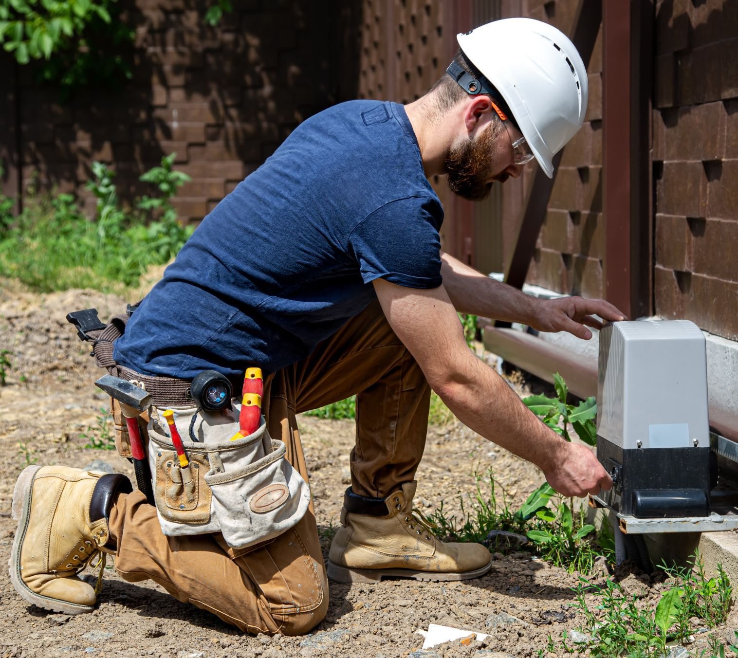 electrician-builder-work-servicing-fuselage-industrial-switchboard-professional-overalls-with-electrician-s-tool